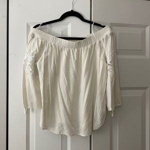 Off the shoulder, open back, lace sleeve top